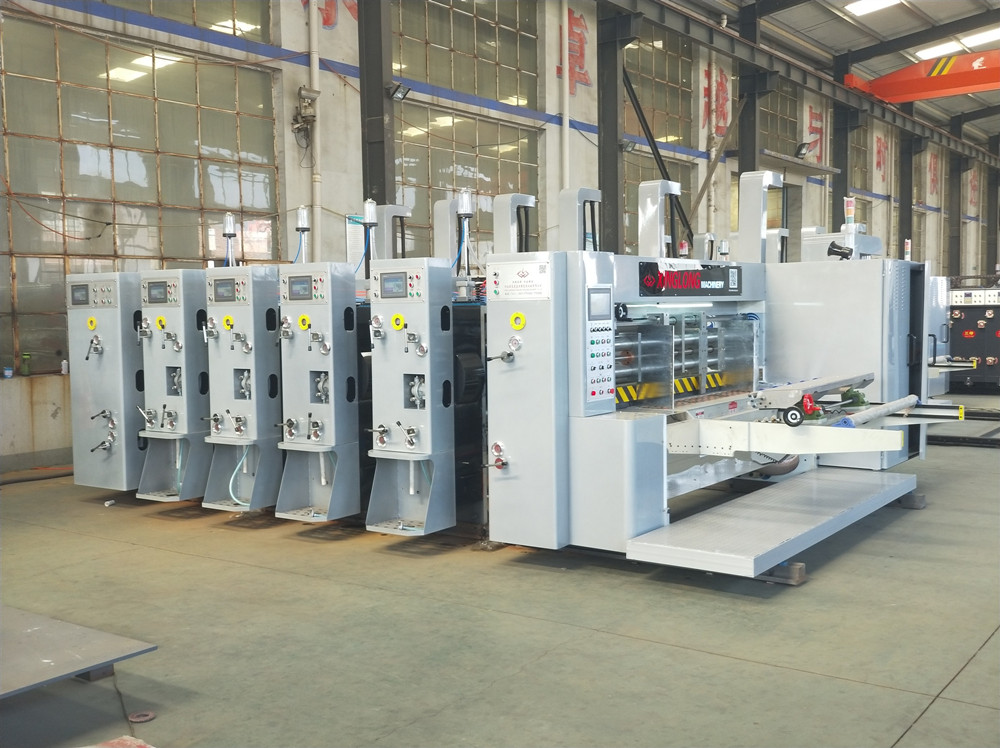 Functional four color printing and slotting machine