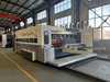 Printing slotting die cutting folding gluing strapping inline